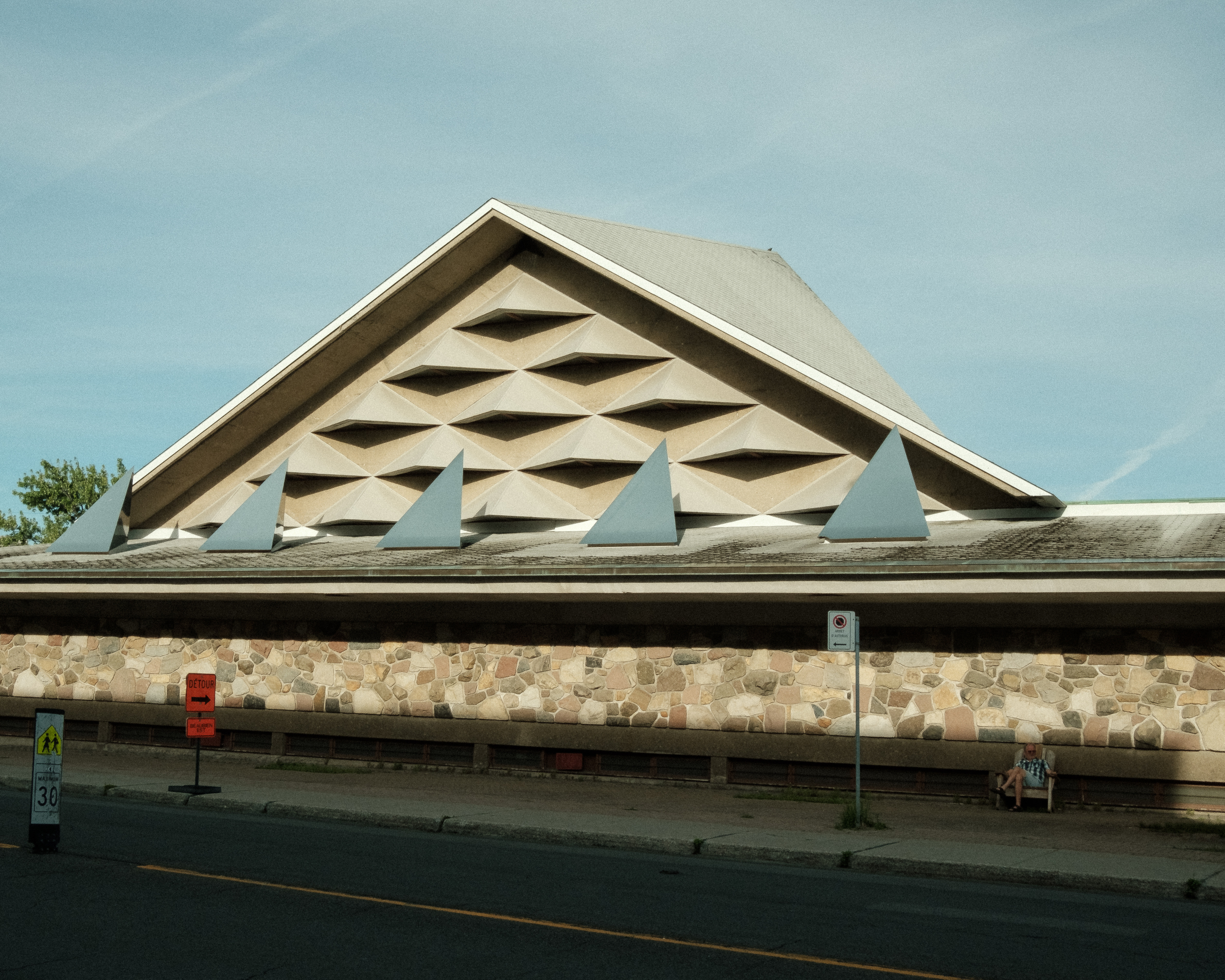 Building with Geometric Roof Design